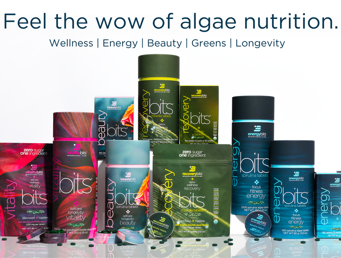 ENERGYbits® Website hero photo with all product packaging and algae tablets 