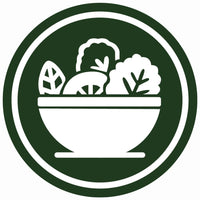 Bowl of greens showing natural nutrition and plant-based wellness from chlorella tablets.