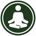 Person meditating to represent balance and relaxation supported by chlorella tabs.